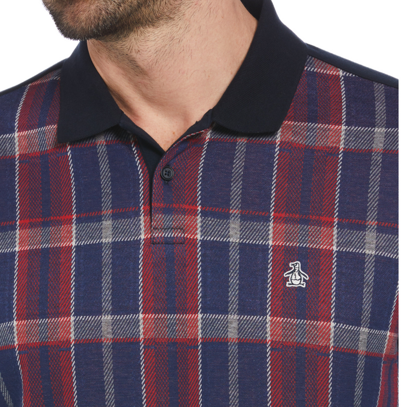 Polo jacquard con frente escocés azul