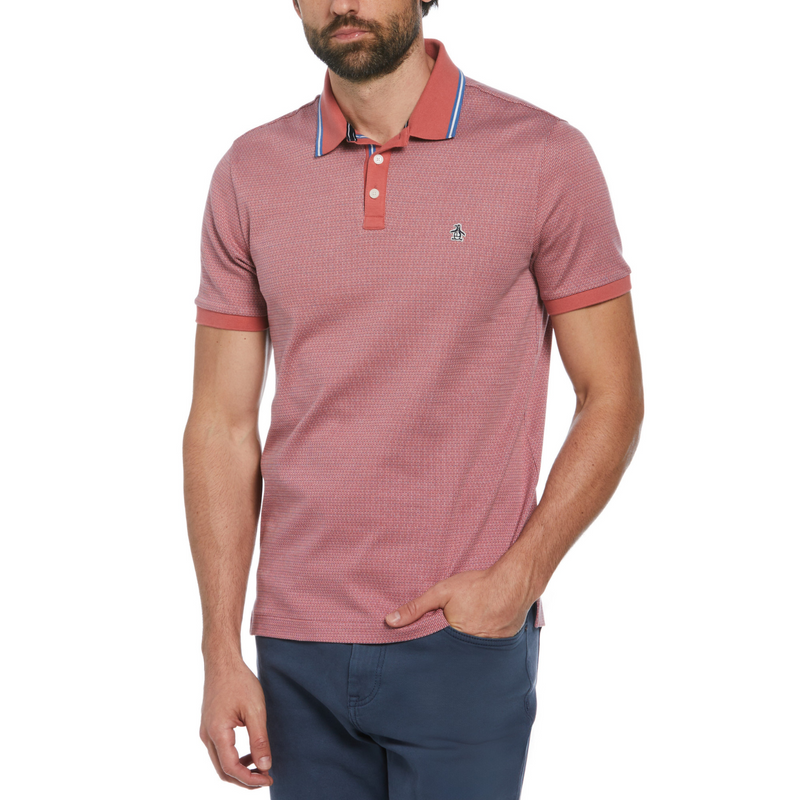 Polo jacquard rojo con ribete azul