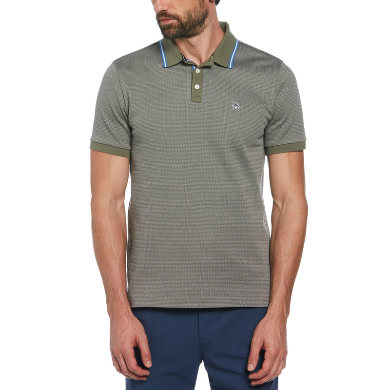 Polo jacquard verde con ribete azul