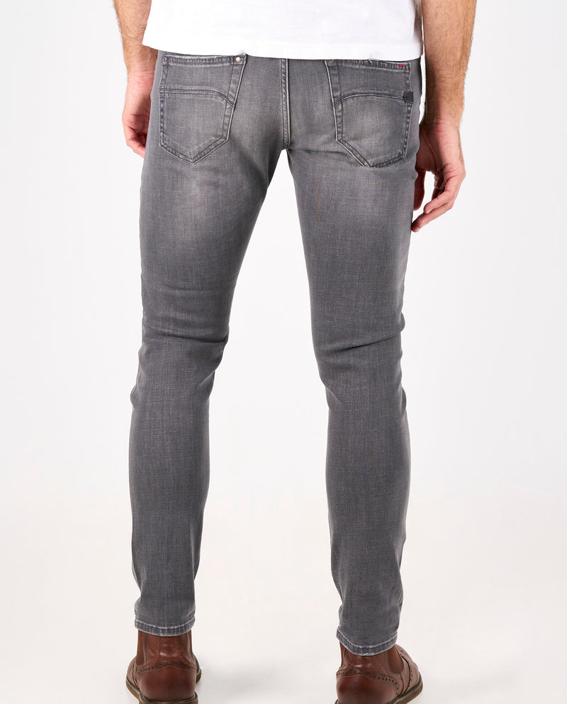 Vaquero de hombre skinny en color gris